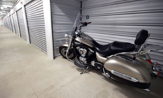 indoor motorcycle storage a motorcycle parked in storage